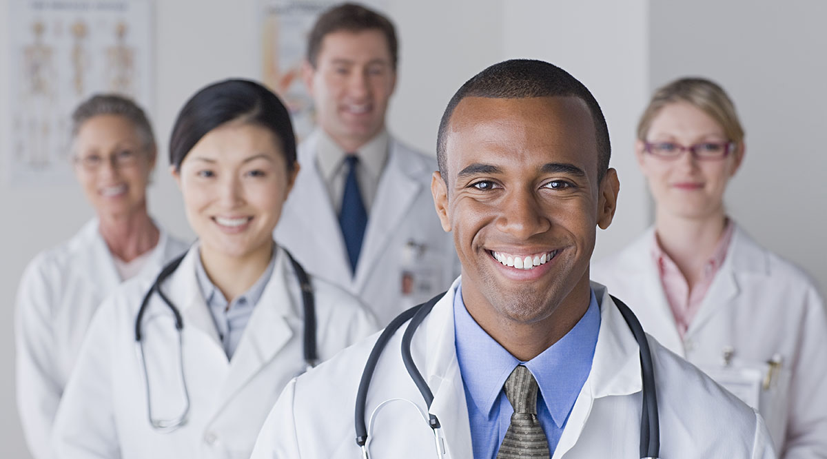 USA, California, Los Angeles, Group portrait of smiling doctors